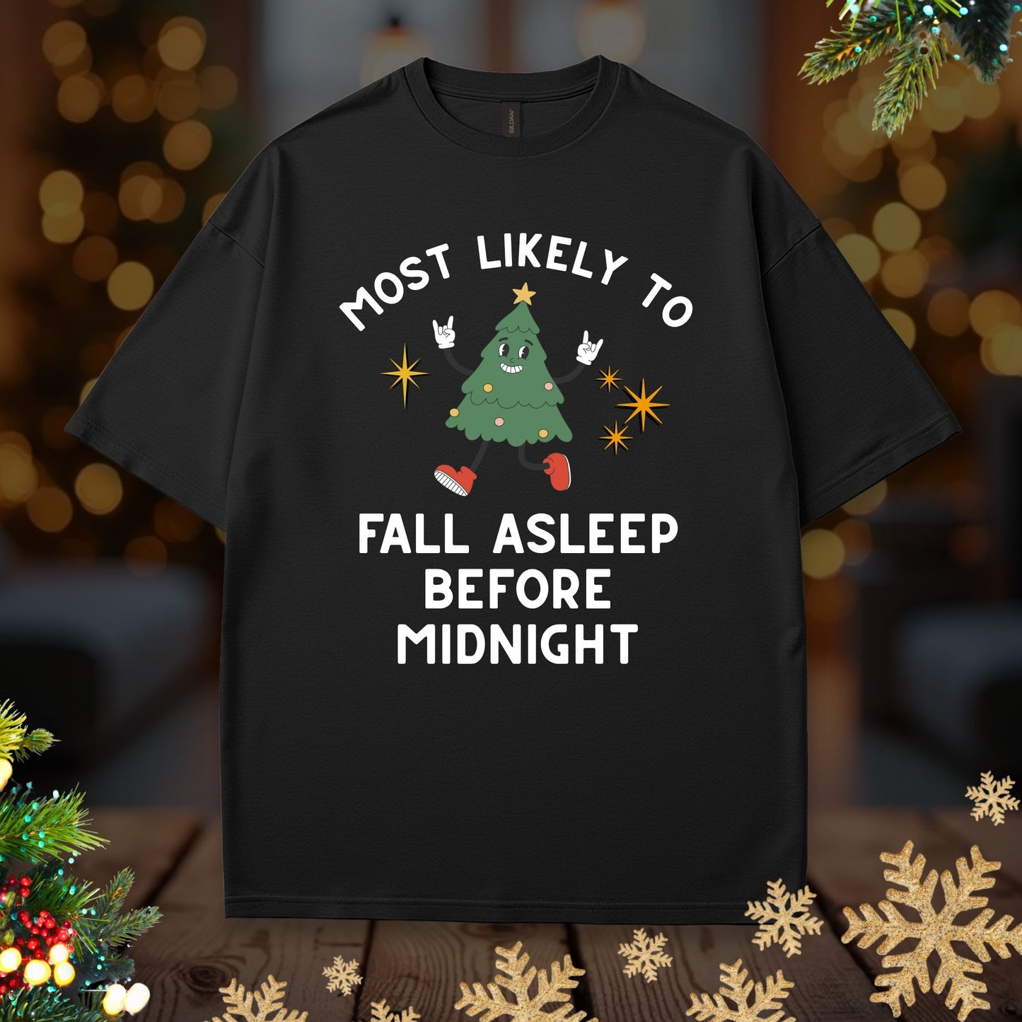 'Most Likely To Fall Asleep Before Midnight’ Christmas Shirt